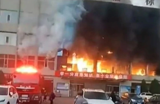 Cháy tòa nhà của doanh nghiệp lớn ở Trung Quốc, 26 người thiệt mạng - Ảnh 1.